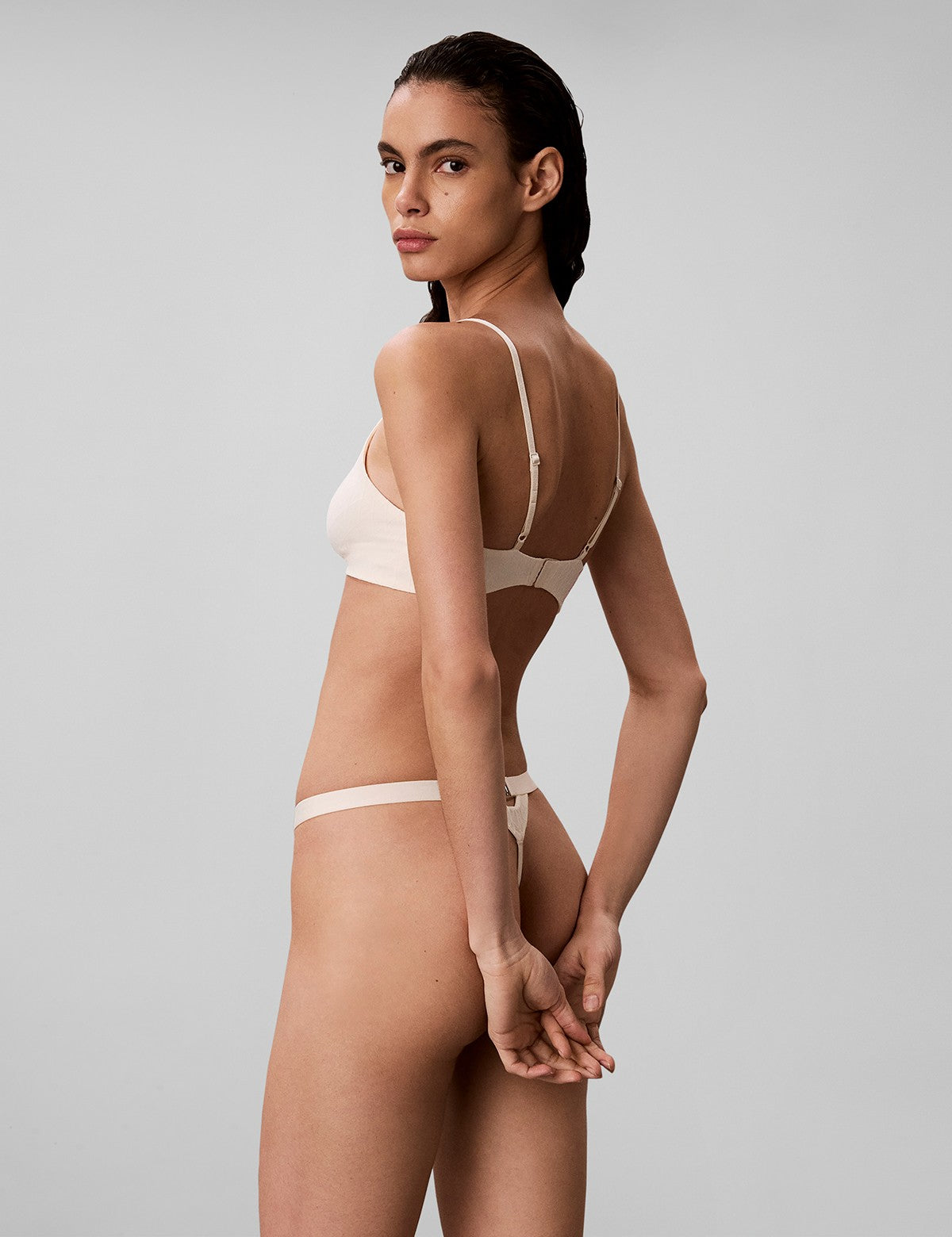 Calvin Klein Women Embossed Emblem String Tanga