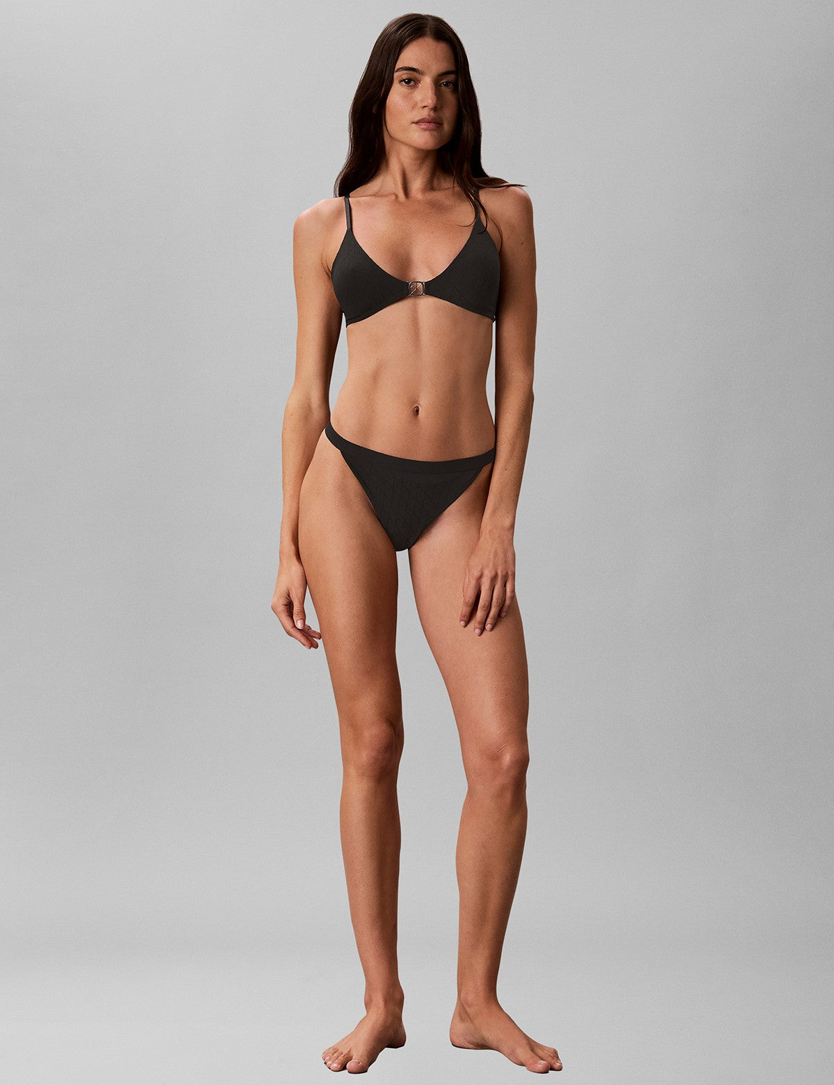 Calvin Klein Women Embossed Emblem String Tanga